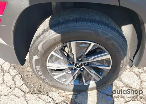 2024 Hyundai Tucson Hybrid Blue z USA, uszkodzony, nr VIN KM8JBCD10RU207301